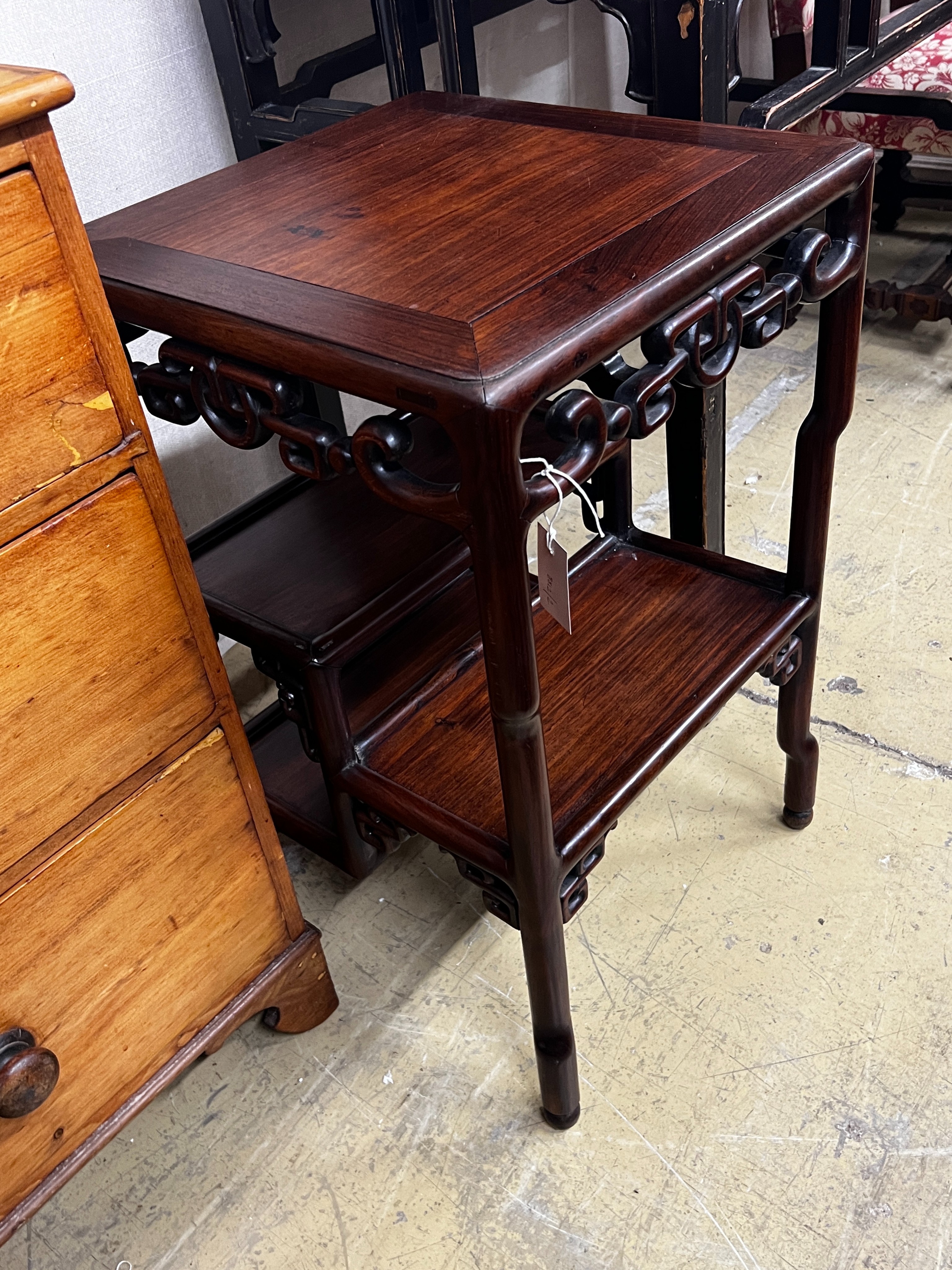 A Chinese carved hongmu two tier table, width 45cm, depth 45cm, height 73cm